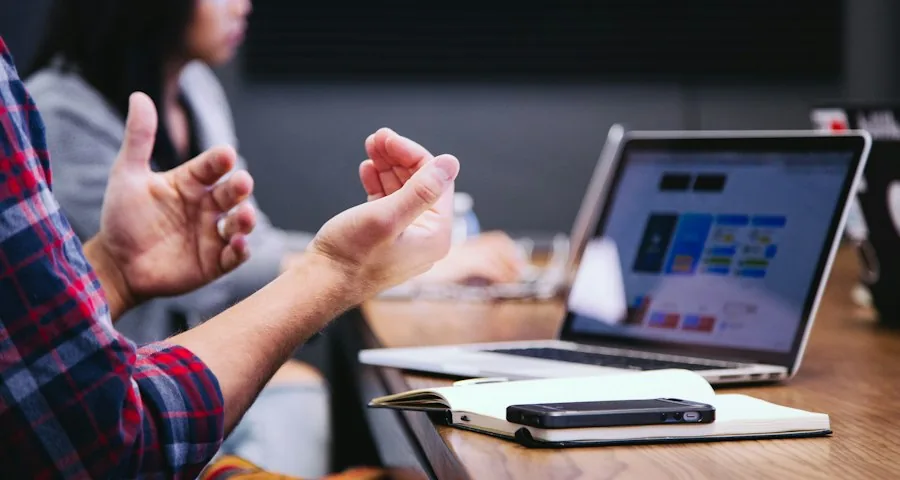 Person writing content strategy notes representing an ongoing content engagement